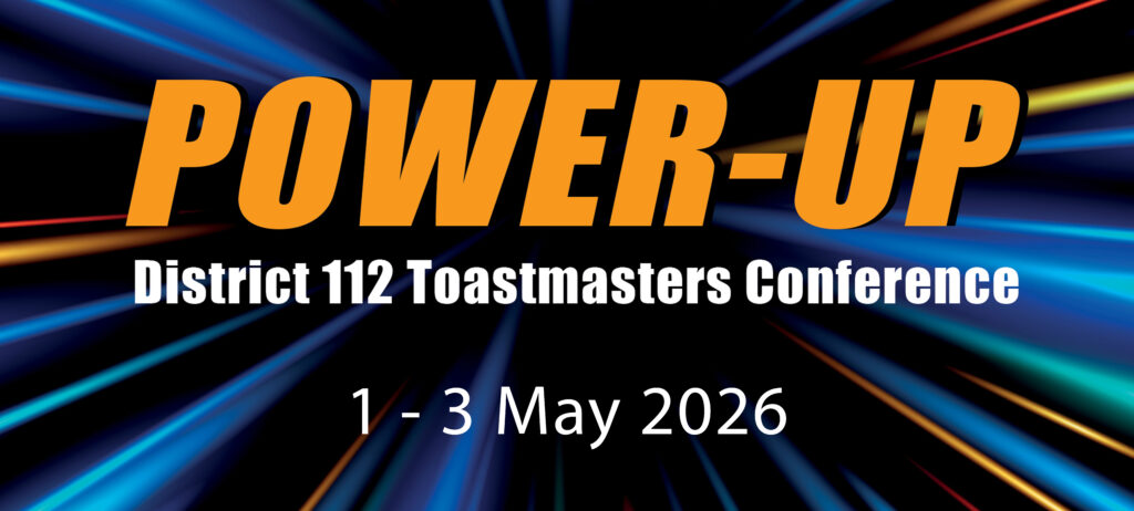 Logo for the Power Up them used in the District 112 conference. Text reads Power-Up District 112 Toastmasters Conference 1 - 3 May 2026